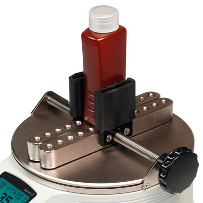 Misura della coppia di torsione di tappi per bottiglie, flaconi, fiale e barattoli